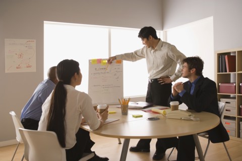 Business people working in office. Photo : Rob Lewine