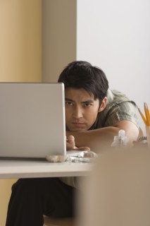 Young businessman at work. Photo : Rob Lewine