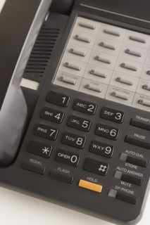Close-up view of office telephone. Photo : Rob Lewine