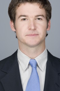 Portrait of young businessman. Photo : Rob Lewine
