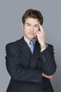 Portrait of young businessman. Photo : Rob Lewine