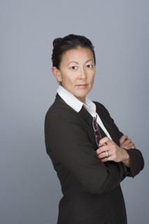 Portrait of happy mature businesswoman. Photo : Rob Lewine