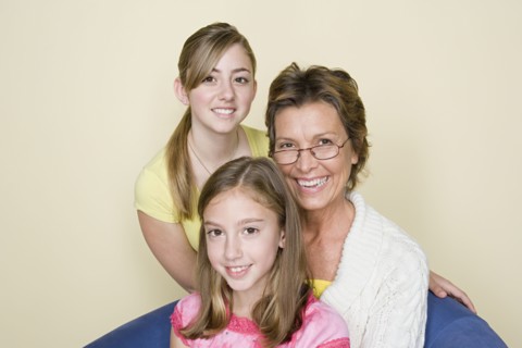 Portrait of grandmother and grand daughters (8-9, 14-15). Photo : Rob Lewine