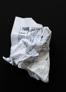 Studio shot of crumpled document.