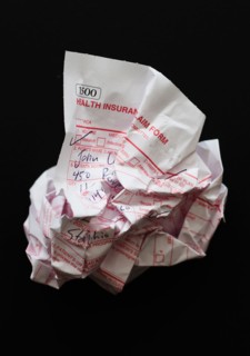 Studio shot of crumpled document.