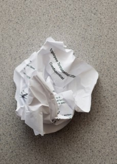 Studio shot of crumpled document.