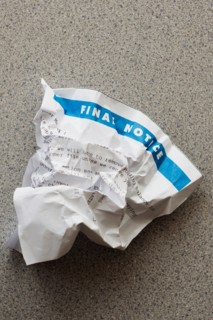 Studio shot of crumpled document.