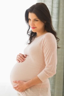 Portrait of pregnant woman.