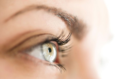 Studio close-up of woman's eye.