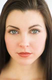 Studio portrait of young woman.