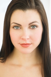 Studio portrait of young woman.