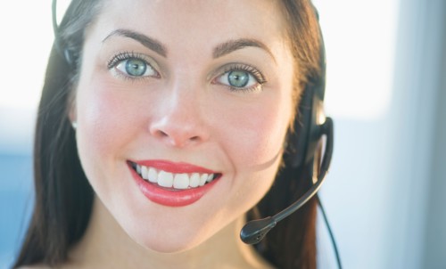 Portrait of female customer service representative.