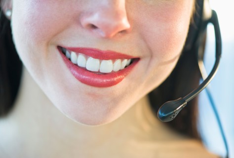 Close-up of female customer service representative.