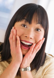 Excited mid adult woman.