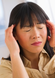 Woman with headache.