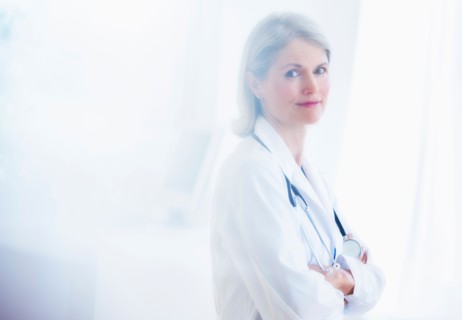 Portrait of senior female doctor .