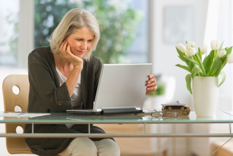 Senior woman working from home.