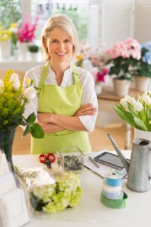 Senior female florist at work.