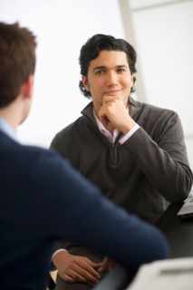 Two businessmen in discussion.