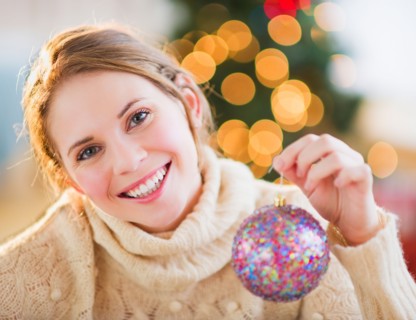 Portrait of beautiful woman wearing wooly sweater. Photo : Daniel Grill