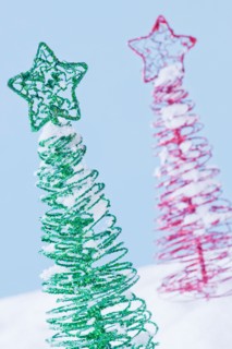 Studio shot of artificial Christmas trees. Photo : Daniel Grill
