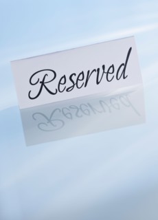 Studio shot of reserved sign. Photo : Daniel Grill
