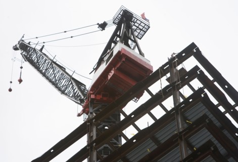 part of construction frame and crane. Photo : fotog