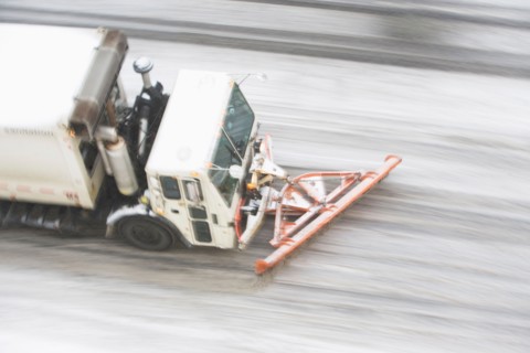 USA, New York State, New York City, high angle view of Snowplow plowing snow out of street. Photo :