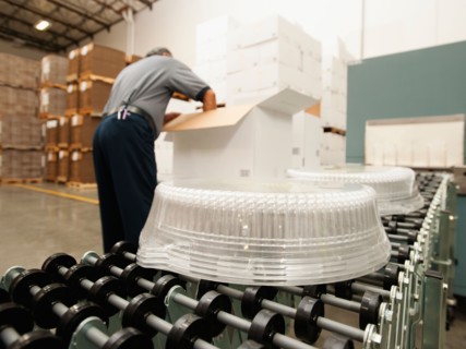 Warehouse worker assembling merchandise.
