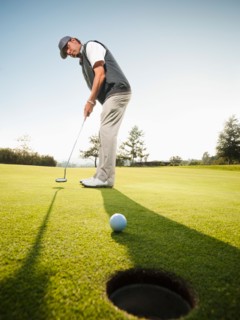 USA, California, Mission Viejo, Man playing golf.
