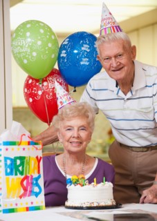 Senior couple celebrating birthday.