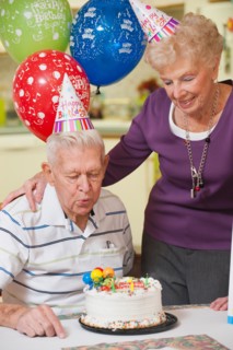 Senior couple celebrating birthday.
