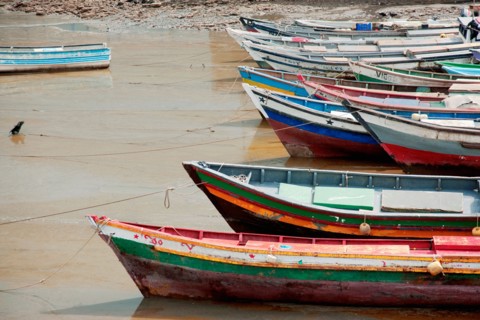 Panama, Panama City, Fishing boats on coastline at low tide. Photo : DreamPictures
