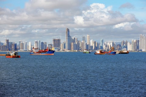 Panama, Panama City, Boats with skyline in background. Photo : DreamPictures