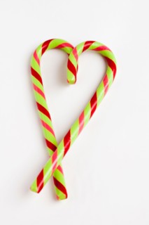 Peppermint candy canes in heart shape, studio shot. Photo : Sarah M. Golonka