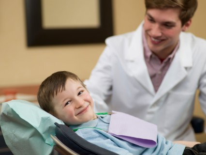 Dentist and patient in dental surgery. Photo : Dan Bannister