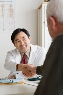 Doctor and patient shaking hands. Photo : Rob Lewine