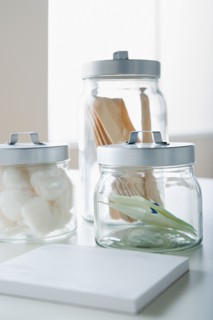 Cotton swabs and tongue depressors in jars. Photo : Rob Lewine