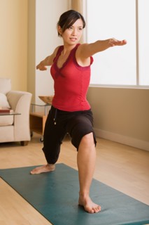 Woman in yoga pose. Photo : Rob Lewine