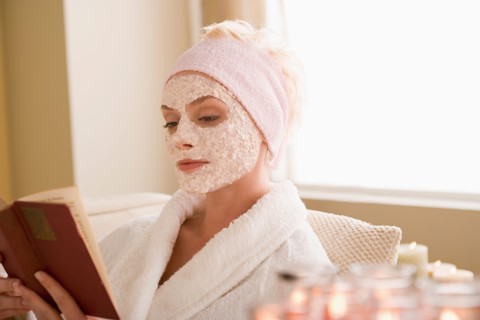 Woman reading book in spa. Photo : Rob Lewine