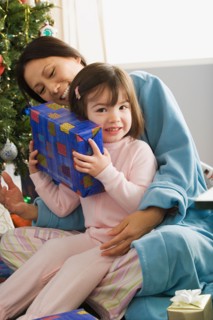 Mother and daughter (10-11) at Christmas morning. Photo : Rob Lewine