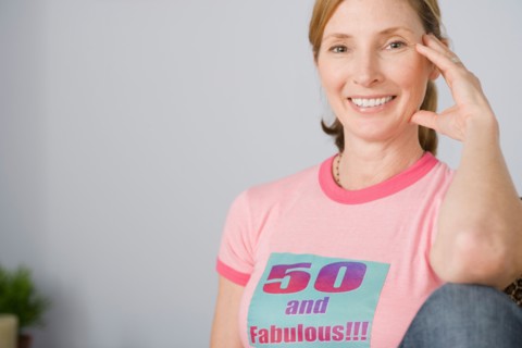 Portrait of smiling mature woman. Photo : Rob Lewine
