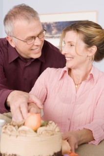 Mature couple celebrating birthday. Photo : Rob Lewine