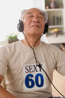 Man with headphones on. Photo : Rob Lewine
