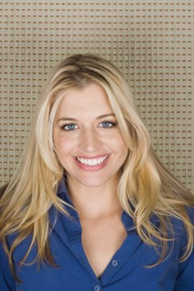 Portrait of woman in blonde hair. Photo : Rob Lewine