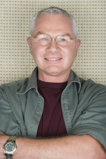 Portrait of older man in spectacles. Photo : Rob Lewine