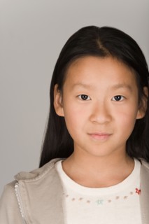 Studio portrait of teen (16-17) girl. Photo : Rob Lewine