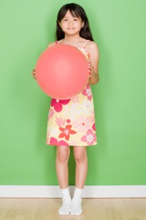 Studio shot portrait of teenage girl, full length. Photo : Rob Lewine