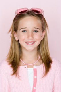Studio shot portrait of teenage girl, head and shoulders. Photo : Rob Lewine