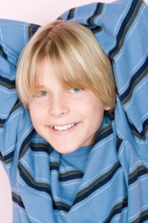 Studio shot portrait of teenage boy, close-up. Photo : Rob Lewine